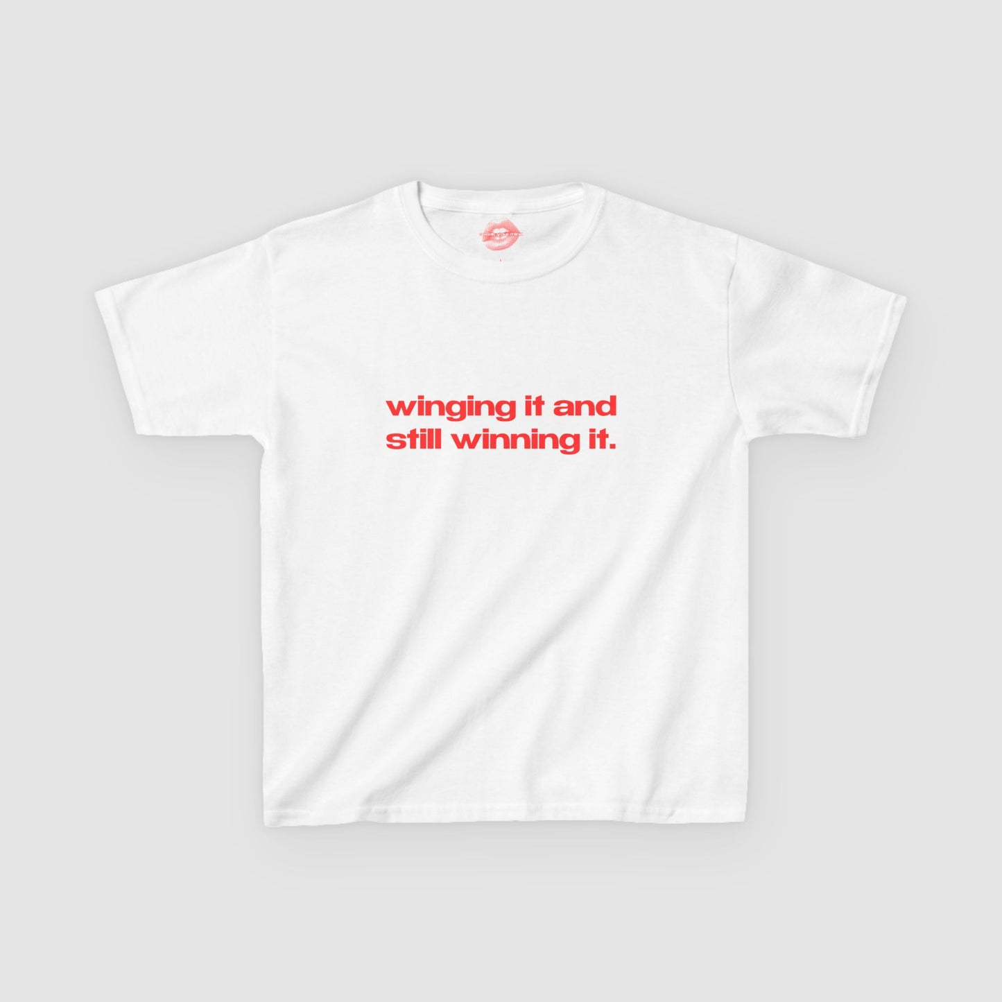 "Winging It And Still Winning It." | Text Only | Baby Tee