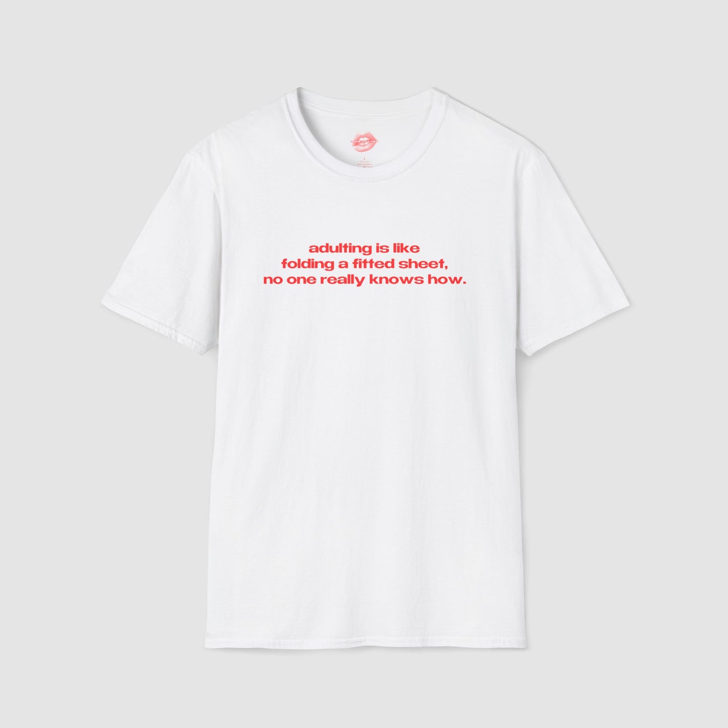 "Adulting Is Like Folding A Fitted Sheet, No One Really Knows How." | Text Only | T-Shirt
