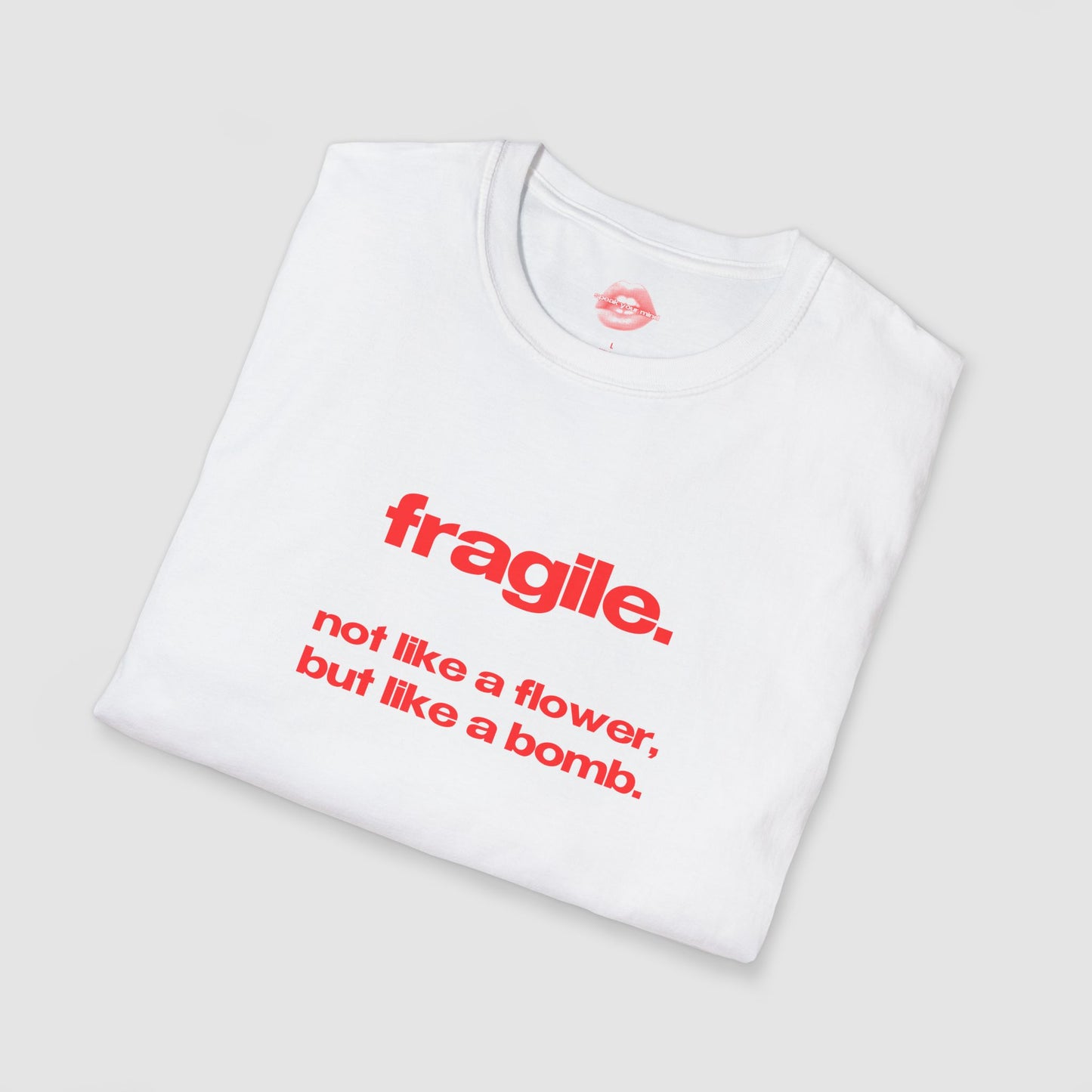 "Fragile. Not Like A Flower, But Like A Bomb." | Text Only | T-Shirt
