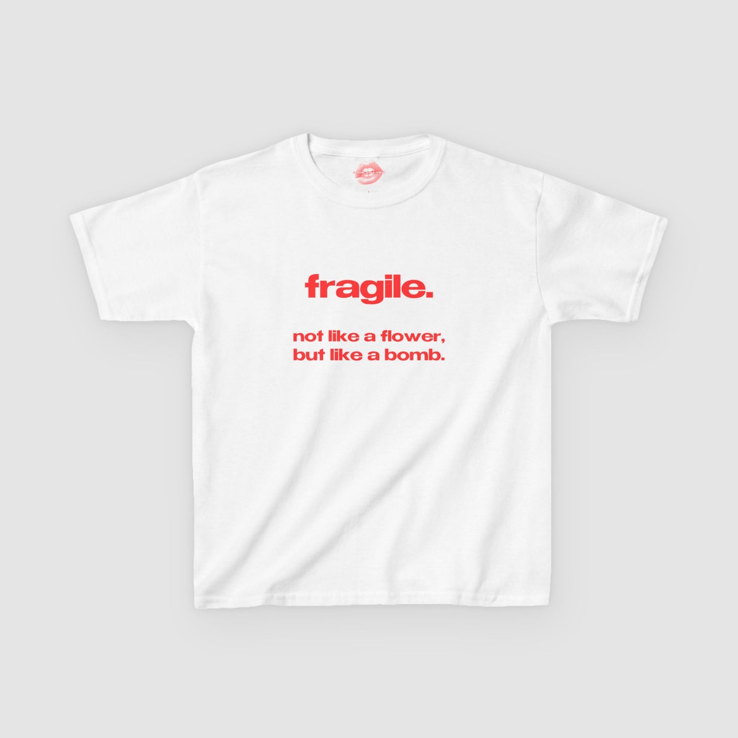 "Fragile. Not Like A Flower, But Like A Bomb." | Text Only | Baby Tee