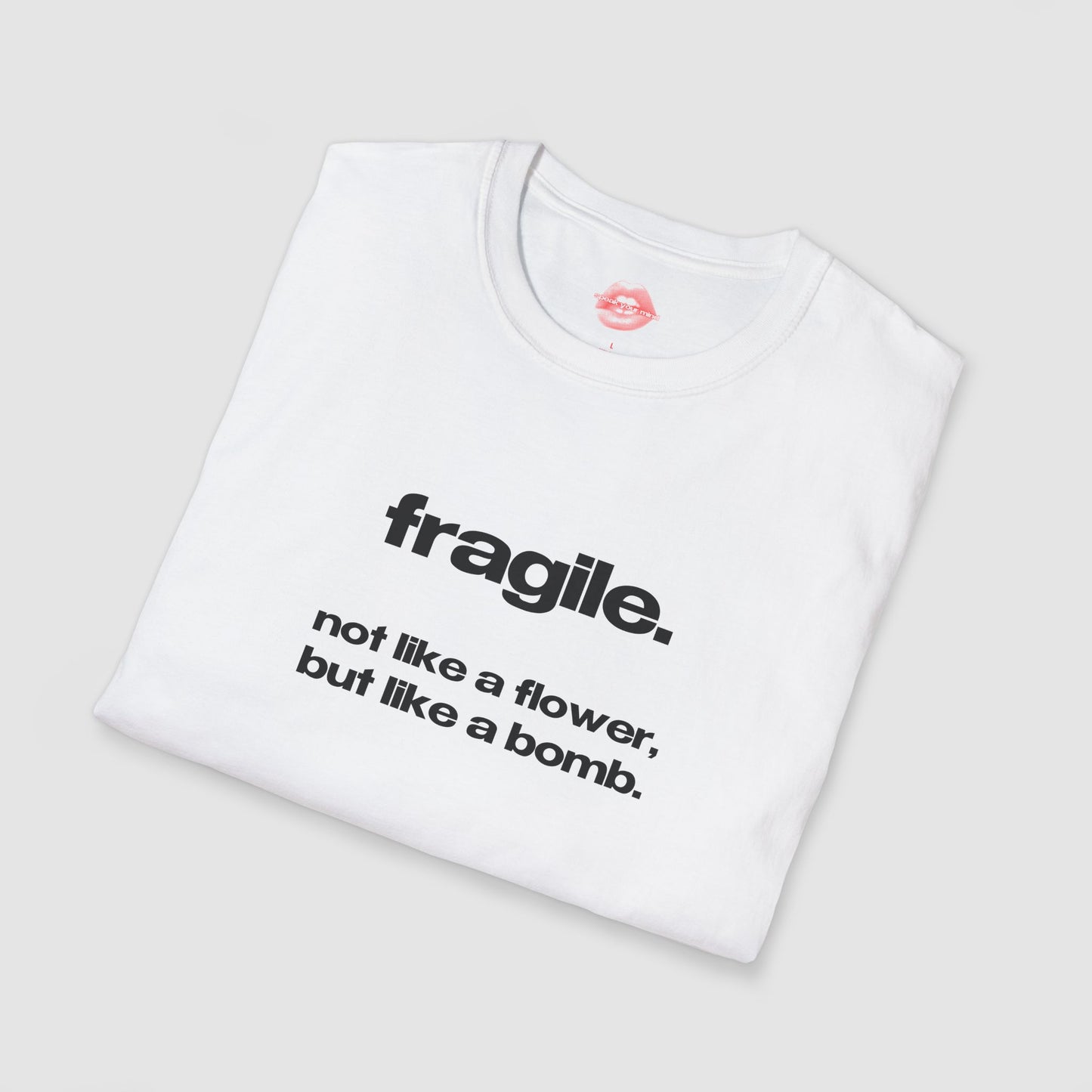 "Fragile. Not Like A Flower, But Like A Bomb." | Text Only | T-Shirt