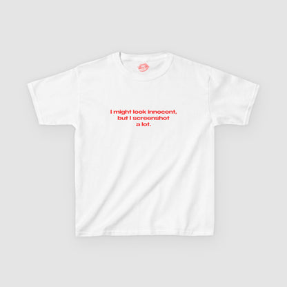"I Might Look Innocent, But I Screenshot A Lot." | Text Only | Baby Tee
