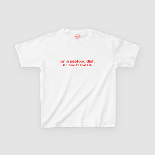 "On A Seafood Diet, If I See It I Eat It." | Text Only | Baby Tee