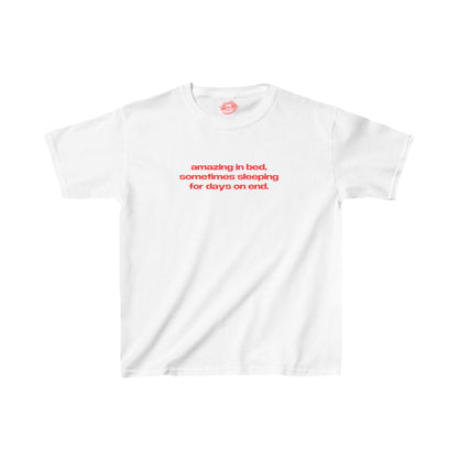 "Amazing In Bed, Sometimes Sleeping For Days On End." | Text Only | Baby Tee