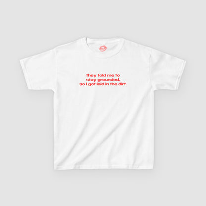 "They Told Me To Stay Grounded, So I Got Laid In The Dirt." | Text Only | Baby Tee