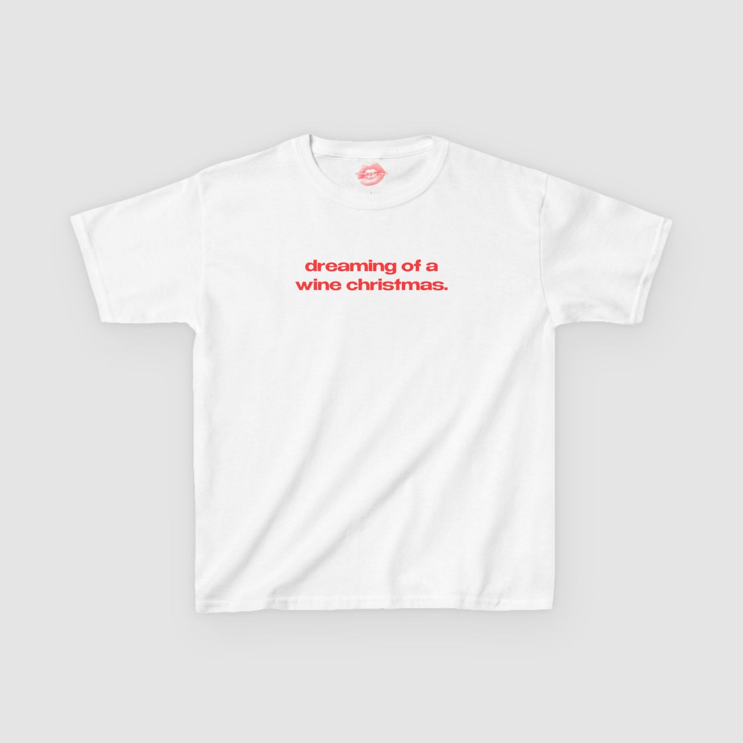 "Dreaming Of A Wine Christmas." | Text Only | Baby Tee