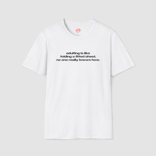 "Adulting Is Like Folding A Fitted Sheet, No One Really Knows How." | Text Only | T-Shirt